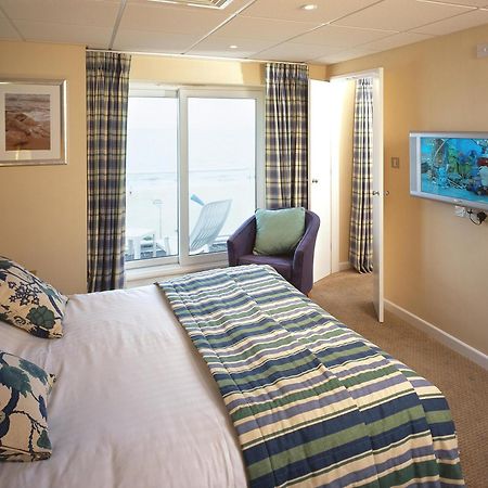 Sandbanks Hotel Пул Номер фото